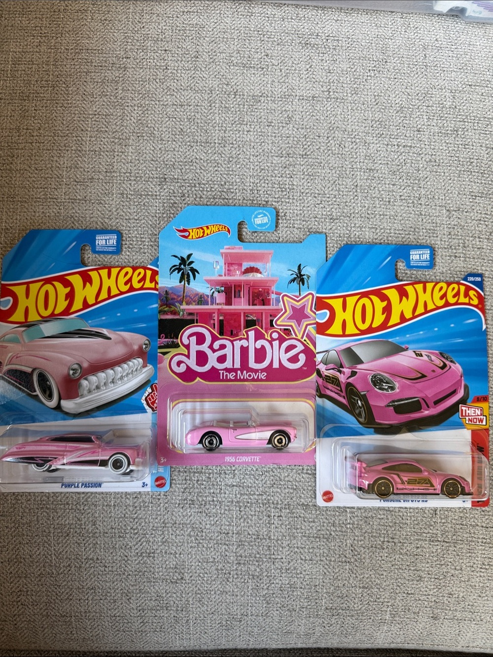 3 pink Hot Wheels
